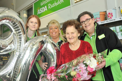 Asda Rushden customer Olive Lovell with colleagues
